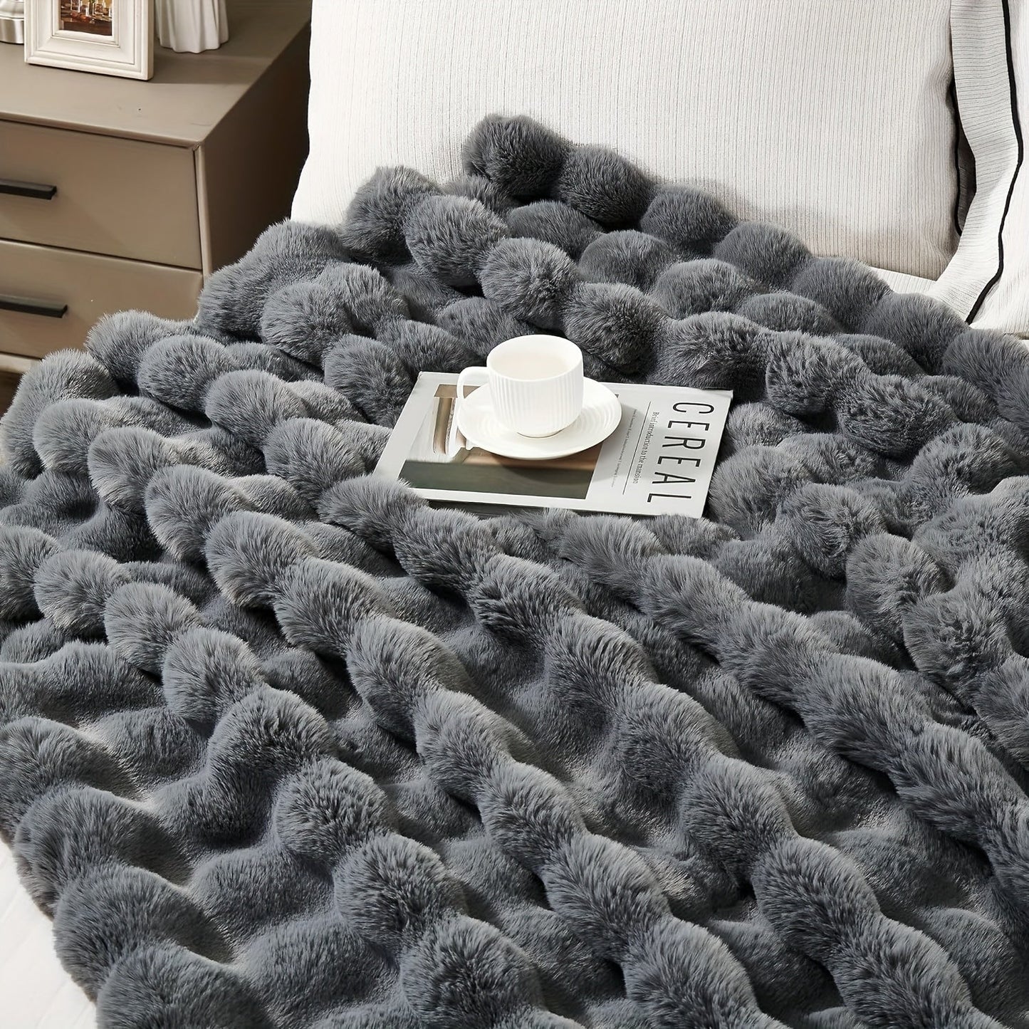 Get cozy with this versatile 1pc Double-sided Rabbit Fleece Blanket. Made with soft faux fur plush material, this solid color blanket is perfect for keeping warm on the couch, sofa, office, bed, camping, or travel. It also makes a great multi-purpose