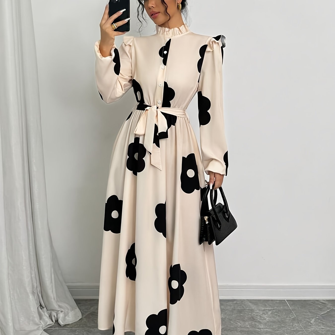 Floral print maxi dress with stand collar, waist detail, lantern sleeves, and ruffle hem, perfect for spring or fall.