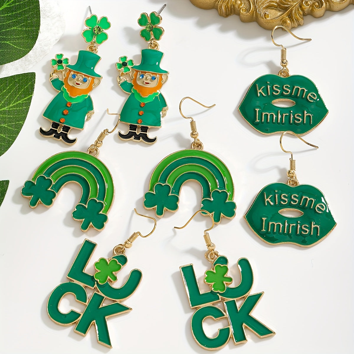 St. Patrick's Day Charm Earrings featuring a Lucky Clover and Rainbow Design adorned with Sparkling Rhinestones. Made with Stainless Steel Posts, these Earrings are crafted from Alloy, making them a Perfect Gift for Her. In Irish Green, Lip-shaped, Oil