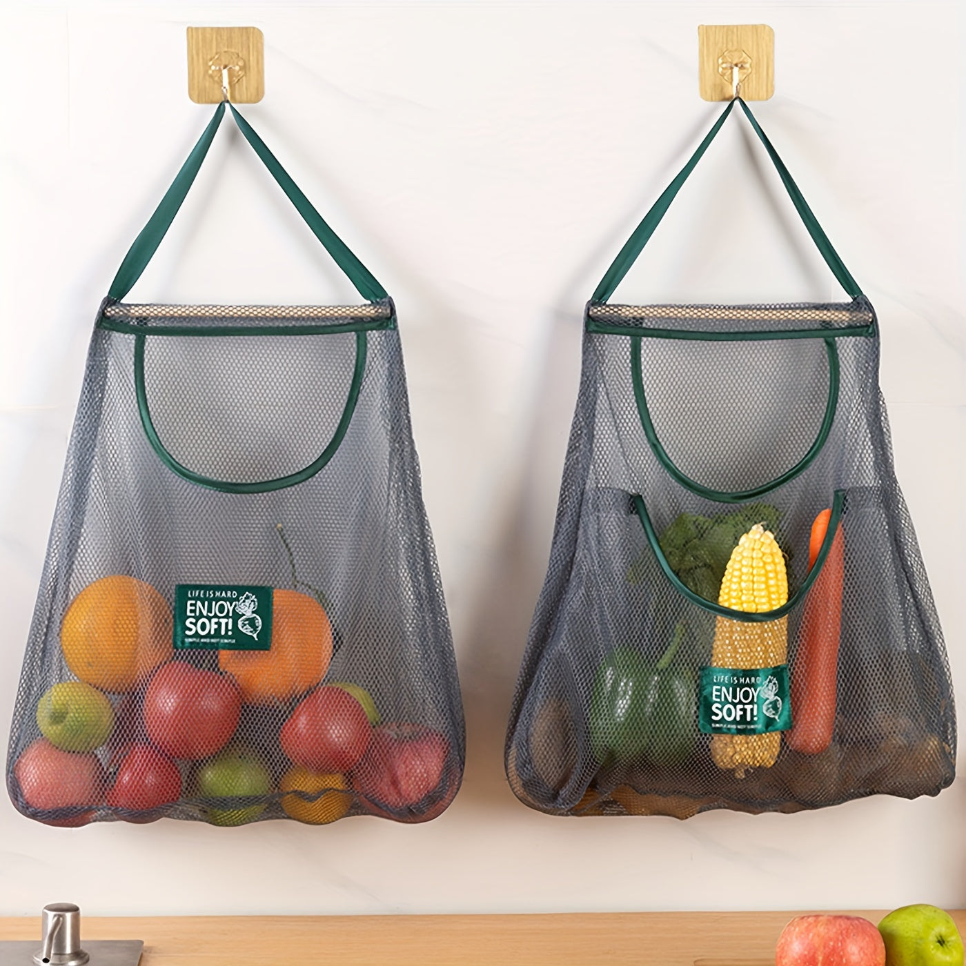 One piece of a mesh hanging bag ideal for storing a variety of items, including garlic, ginger, onion, fruits, and vegetables. This breathable and hangable bag is a versatile storage solution for your kitchen supplies.