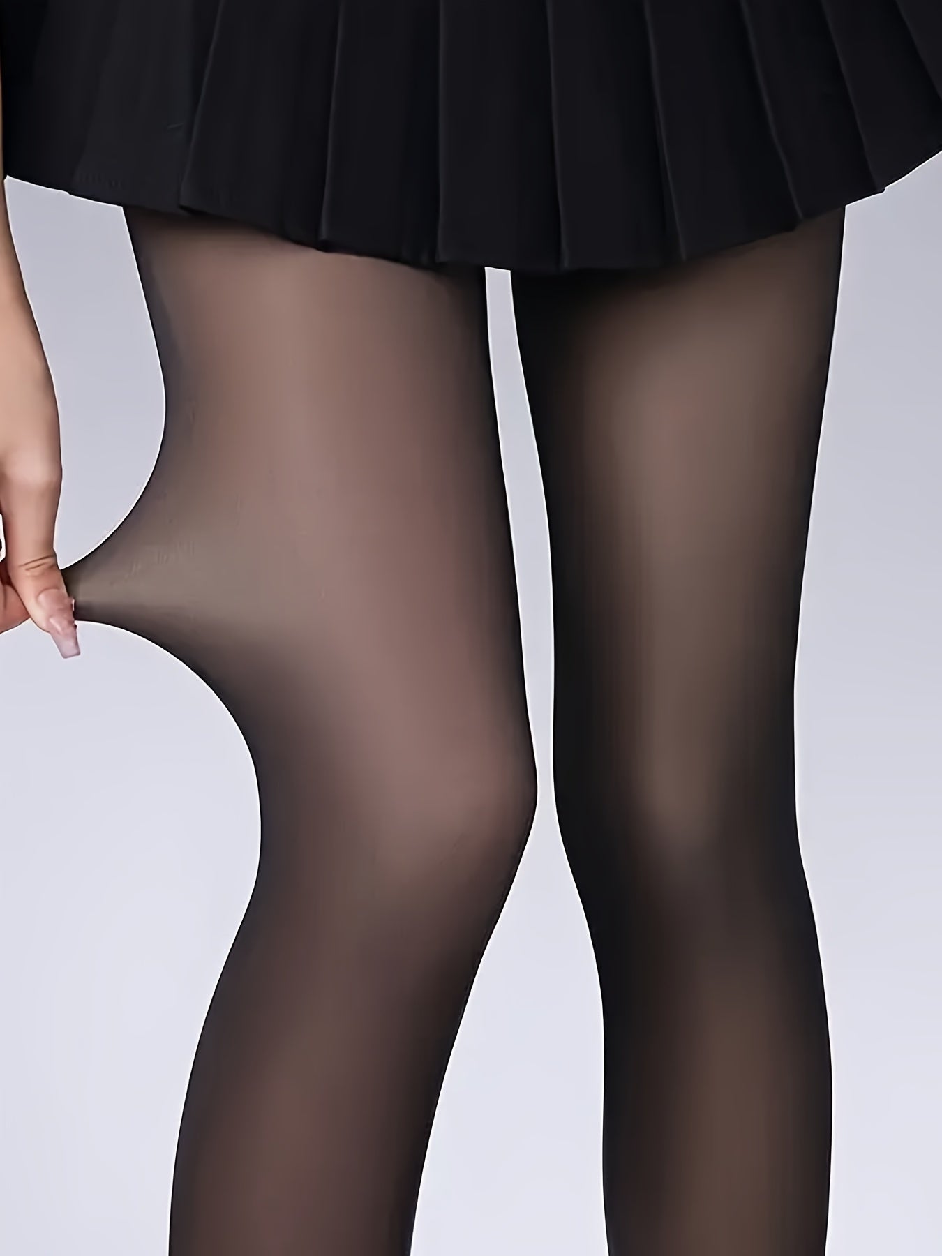 High-waisted sheer nylon tights enhance skin tone for spring and fall, providing comfort and stretch. Ideal for wearing as faux translucent leggings.