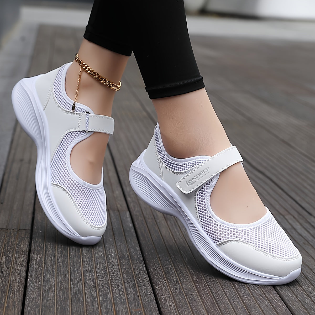 Comfortable slip-on sneakers for women with breathable mesh, supportive arch compression, lightweight non-slip sole, in white.