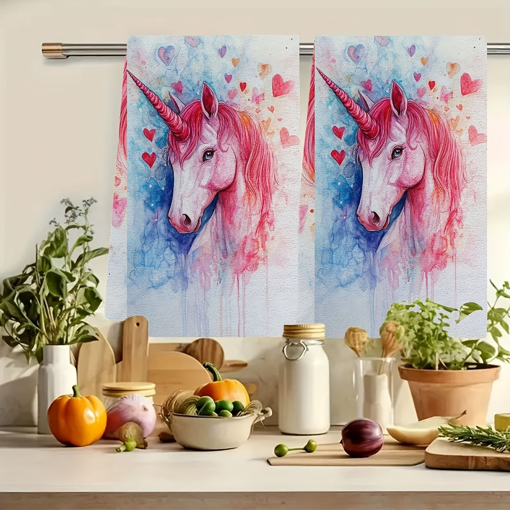 Two pieces of ultra soft kitchen towels with a Valentine's Day unicorn theme. These highly absorbent and machine washable dish hand towels measure 40.64x60.96 cm. Featuring a vibrant watercolor design perfect for holiday decor, these dish towels are a