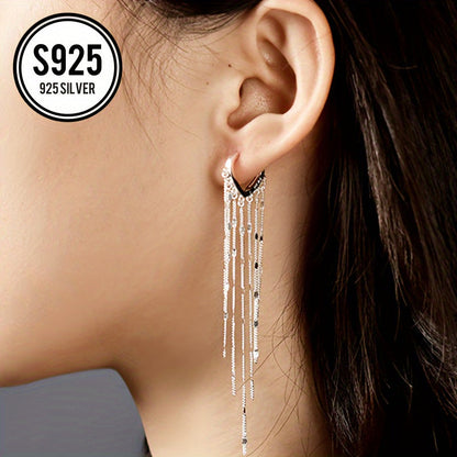 This lightweight and elegant heart tassel ear thread is made of hypoallergenic 925 silver, giving it a shiny and luxurious appearance. The long tassel design helps to slim the face and adds a touch of simplicity and fashion to any outfit. It is a perfect