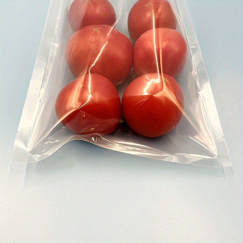 100 vacuum sealed food bags made of silk and transparent polyester nylon material. These bags are designed for vacuum compression and plastic sealing to keep food fresh. They have a glossy commercial finish.