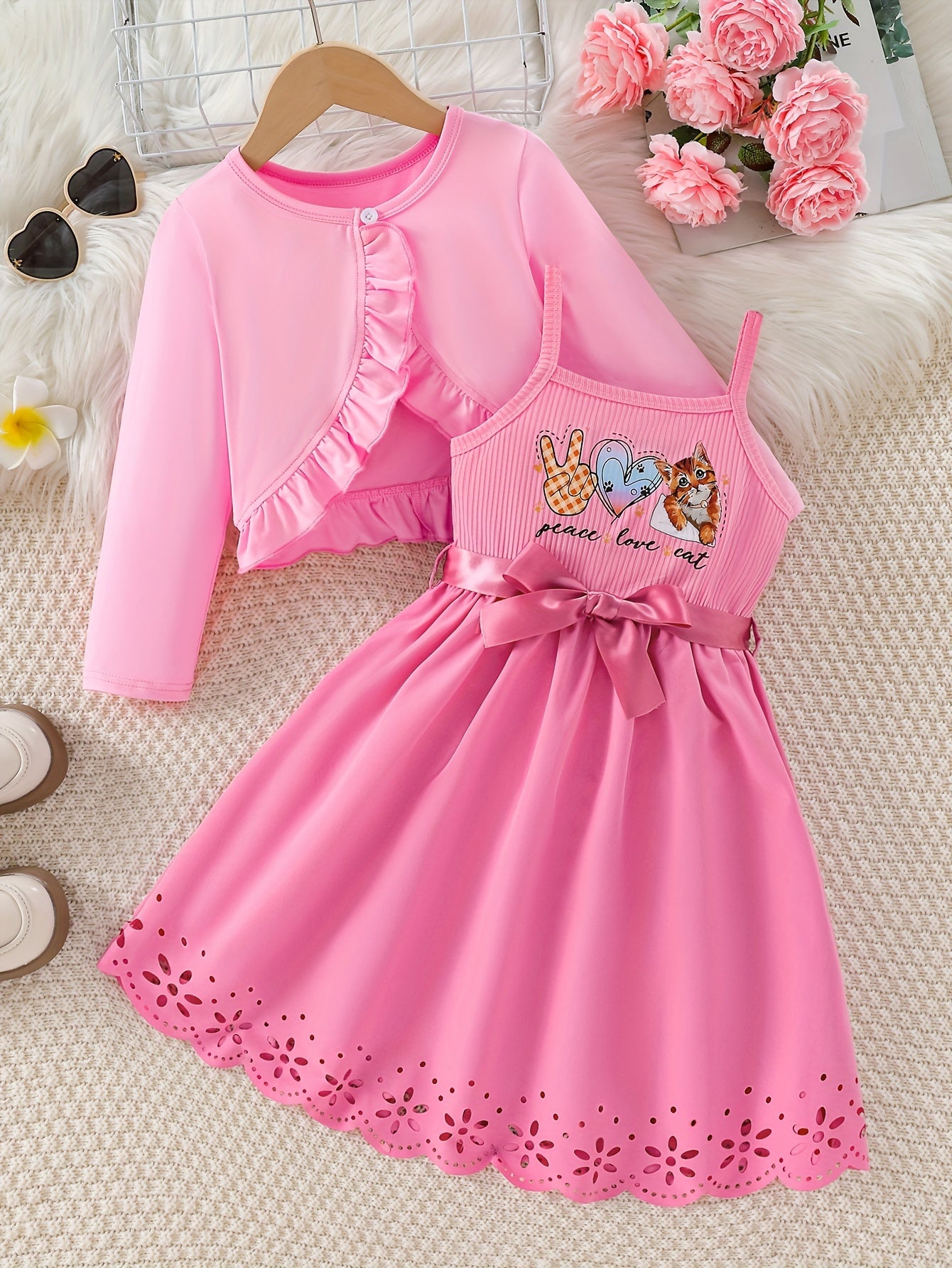 Cute 2-piece set includes frilled long sleeve cardigan top and cat print cami dress. Perfect for spring/fall outdoor activities, as a girls outfit, or as a gift.