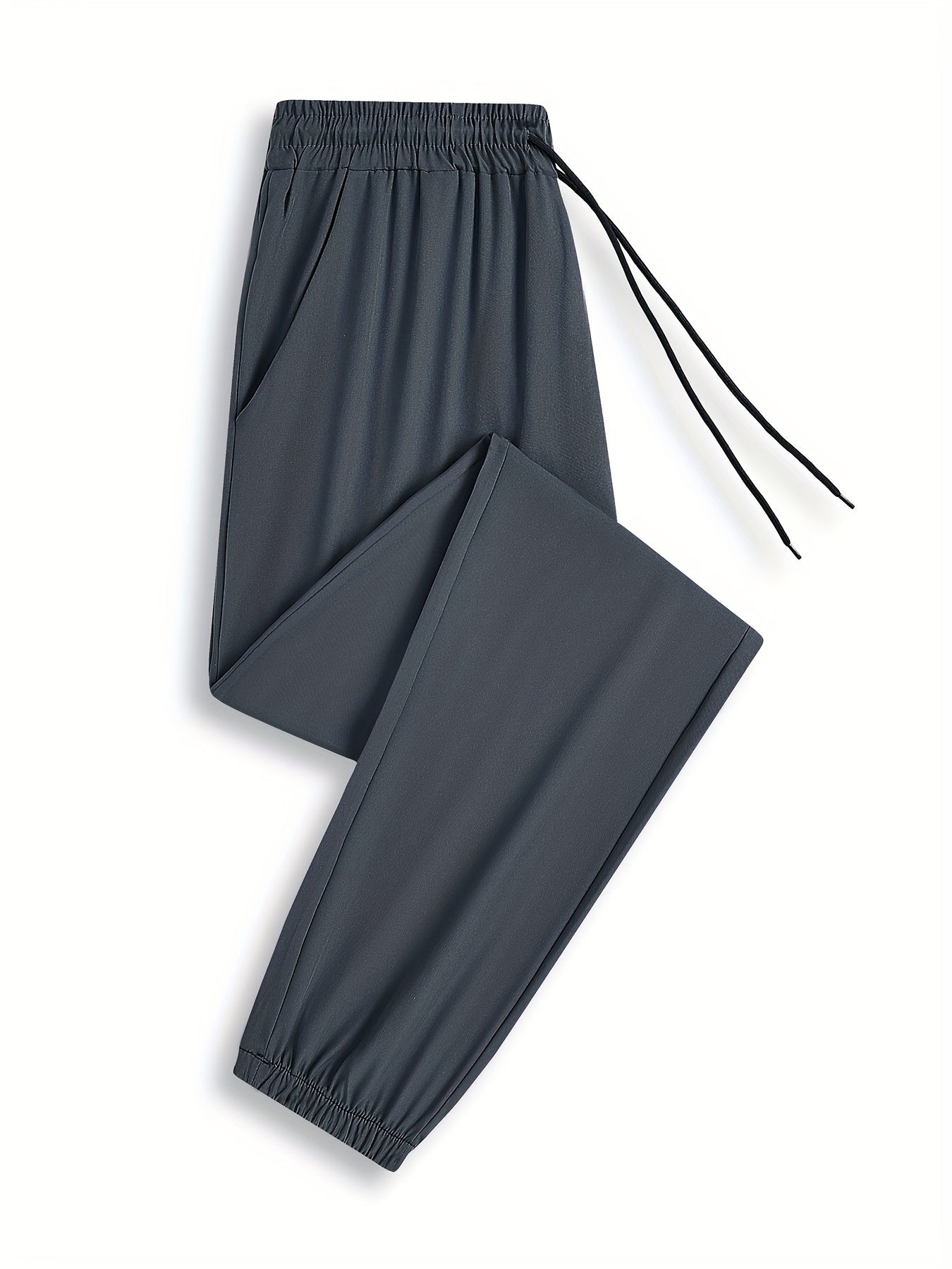 Men's drawstring trousers with pockets for outdoor activities in spring and summer.