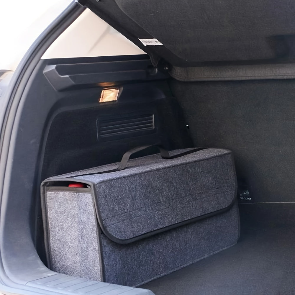 Folding storage box for car interior in black and grey, featuring hook-and-loop fastener for easy installation.