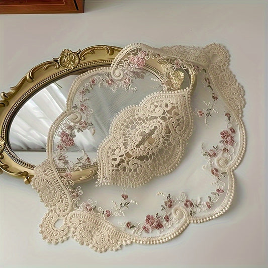 Vintage French lace embroidered placemat in polyester, ideal for dressing up tables or as a photography prop.