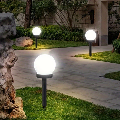 Solar-powered LED garden lights for outdoor landscapes - Durable plastic, automatic on/off, modern design for pathways, yards, decks, lawns, and patios.