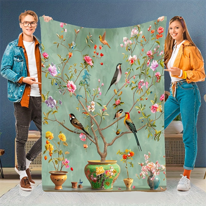 Soft, Portable Green Floral & Bird Print Fleece Blanket. This tear-resistant and stain-proof blanket is made from 100% polyester, offering all-season comfort. Perfect for home decor and travel, it is also machine washable for easy care.