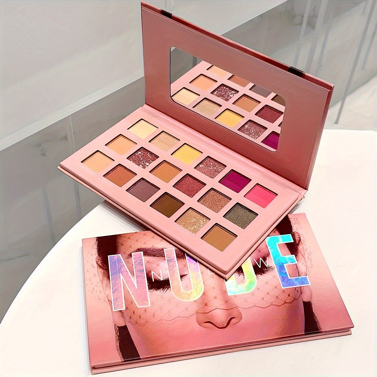 18-Color Desert Rose Eyeshadow Palette with various finishes for festivals, parties, and music events.