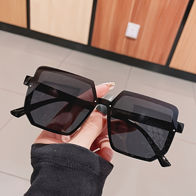 Large square plastic sunglasses for outdoor activities.