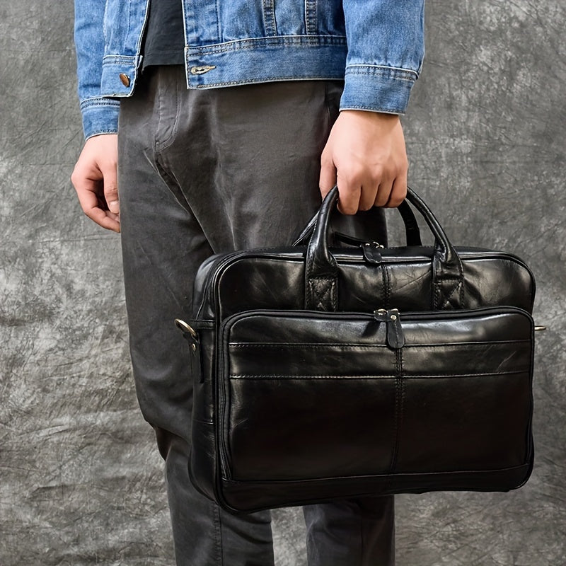 Men's genuine leather briefcase with laptop compartment, adjustable shoulder strap, zipper closure, and polyester lining for office and daily commute.