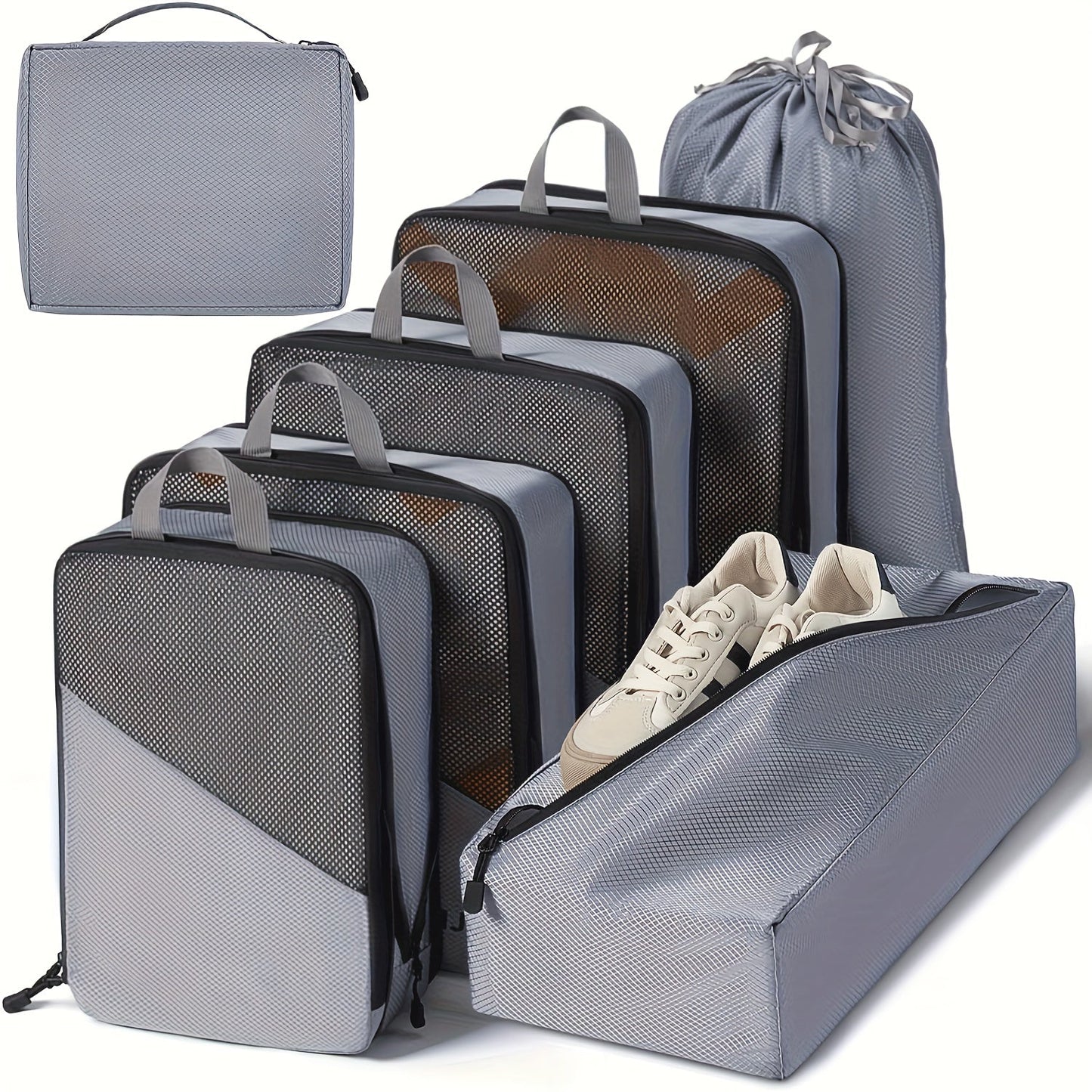 Set of 7 Compression Packing Cubes designed for travel, made from lightweight materials to fit easily into suitcase. Features sturdy handle for convenience, includes cubes for shoes, laundry, and underwear. Essential travel organization tools.