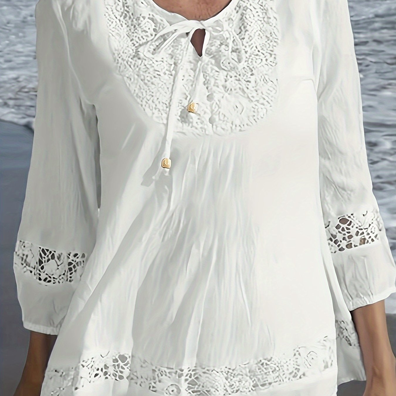 Spring women's plus-size clothing with lace stitching, tie-neck, 3/4 sleeves.