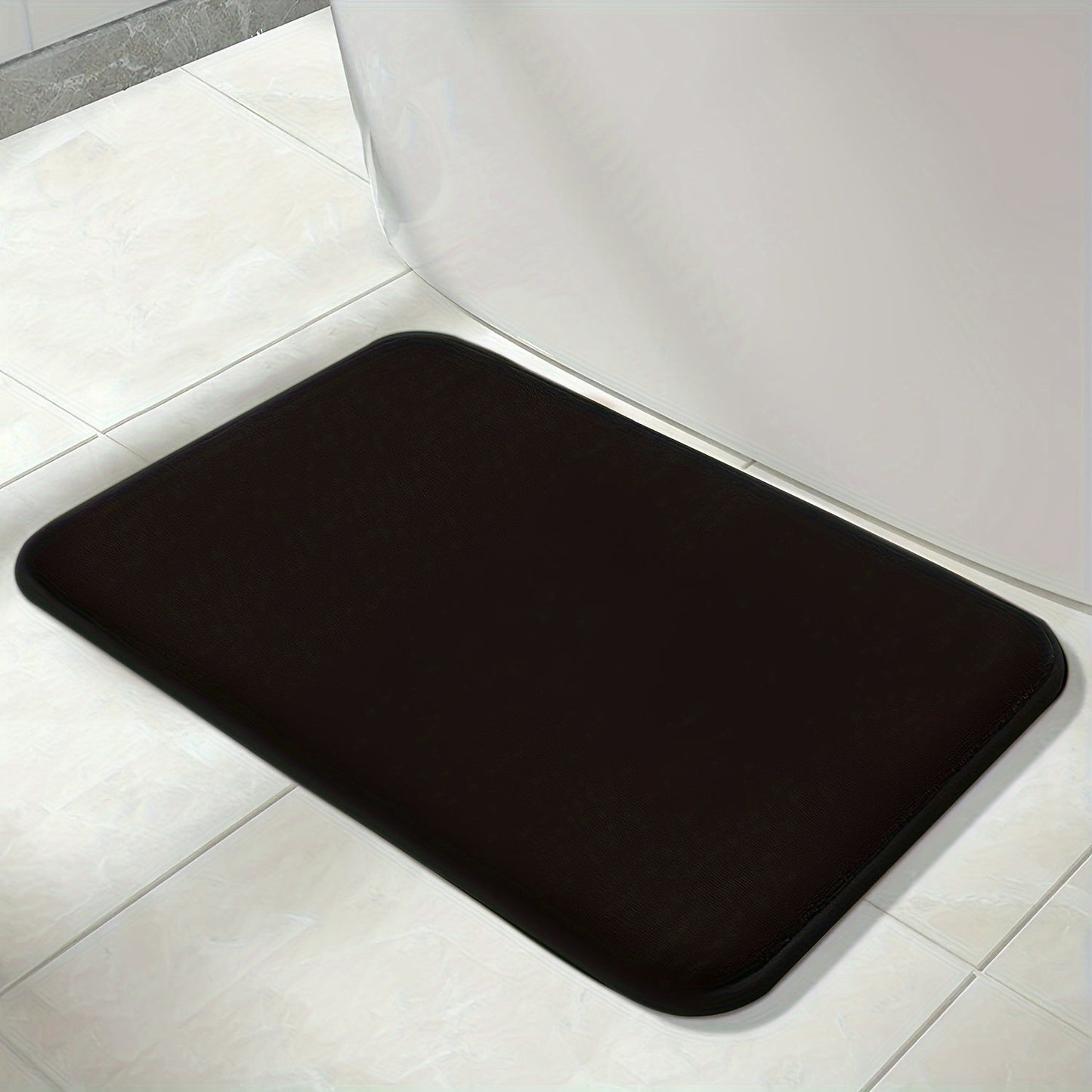 One set of three extended memory foam bath mats featuring a durable non-slip design. Set includes a U-shaped mat, toilet lid cover pad, and cozy bathroom decor for bedroom and living room. Suitable for use in spring, summer, autumn, and winter with a