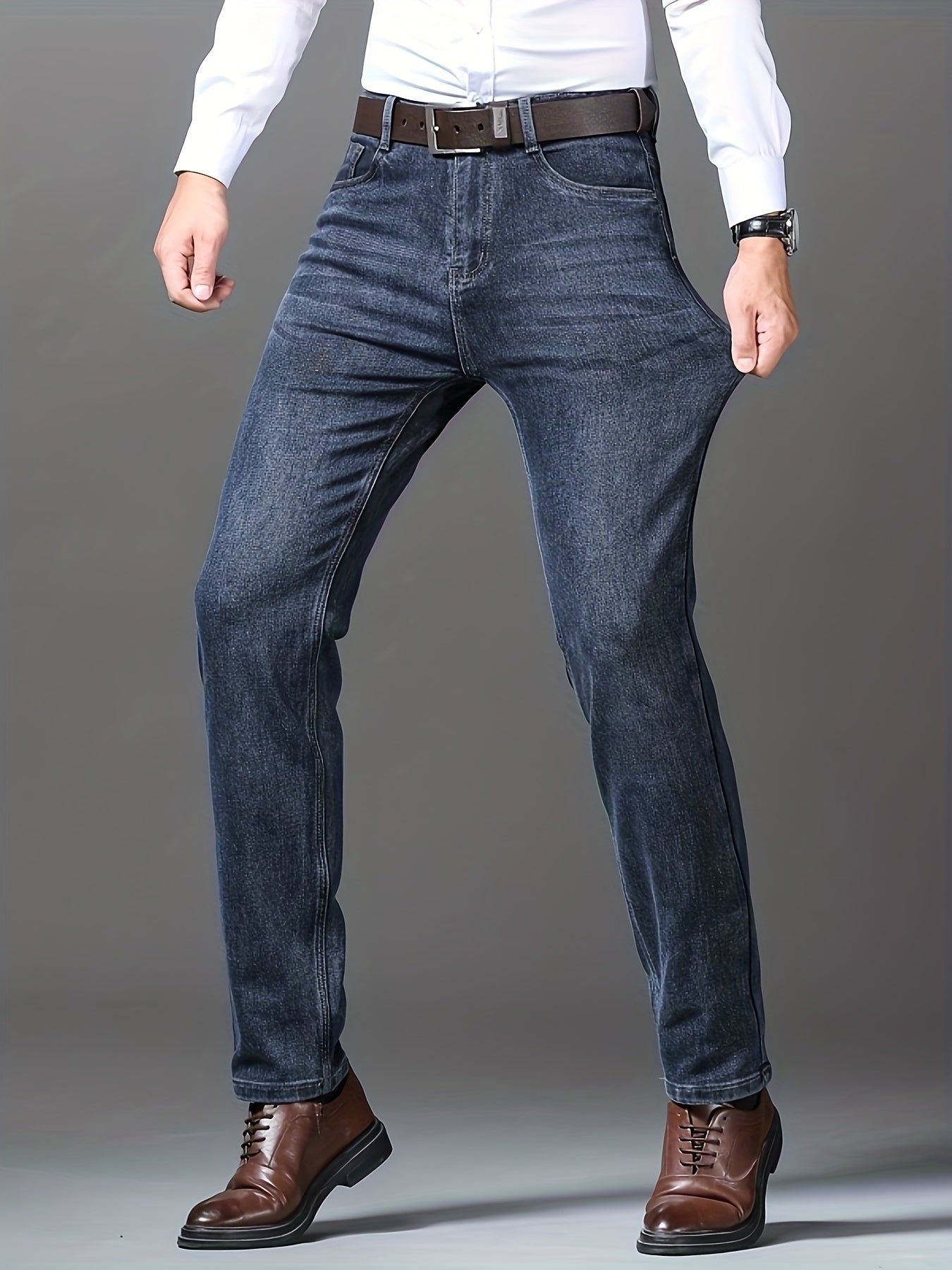 Men's semi-formal stretch denim pants with classic straight leg design and pockets, ideal for fall and winter.