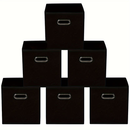 6 pieces of foldable fabric storage bins with handles are available in classic cube designs for organizing your home, bedroom, or office. Choose from black, blue, or cream options.