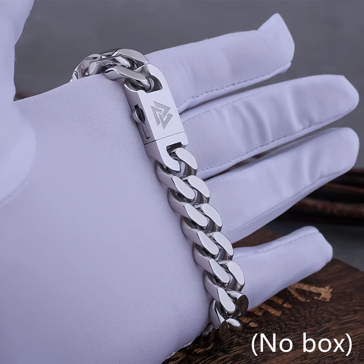 This handsome Stainless Steel Viking Cast Cuban Link Bracelet is designed for men, featuring a fashionable four-sided cut and a finely polished finish. It makes an ideal gift for your boyfriend and is available for wholesale purchase without a box.