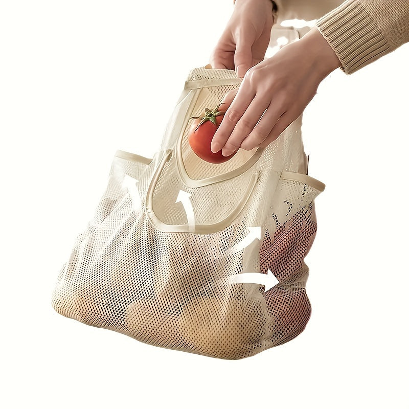 Organize your kitchen or bathroom with this durable polyester wall-mounted mesh storage bag. Featuring a drawstring closure, perfect for storing onions, garlic, fruits, and vegetables in a convenient and space-saving manner.