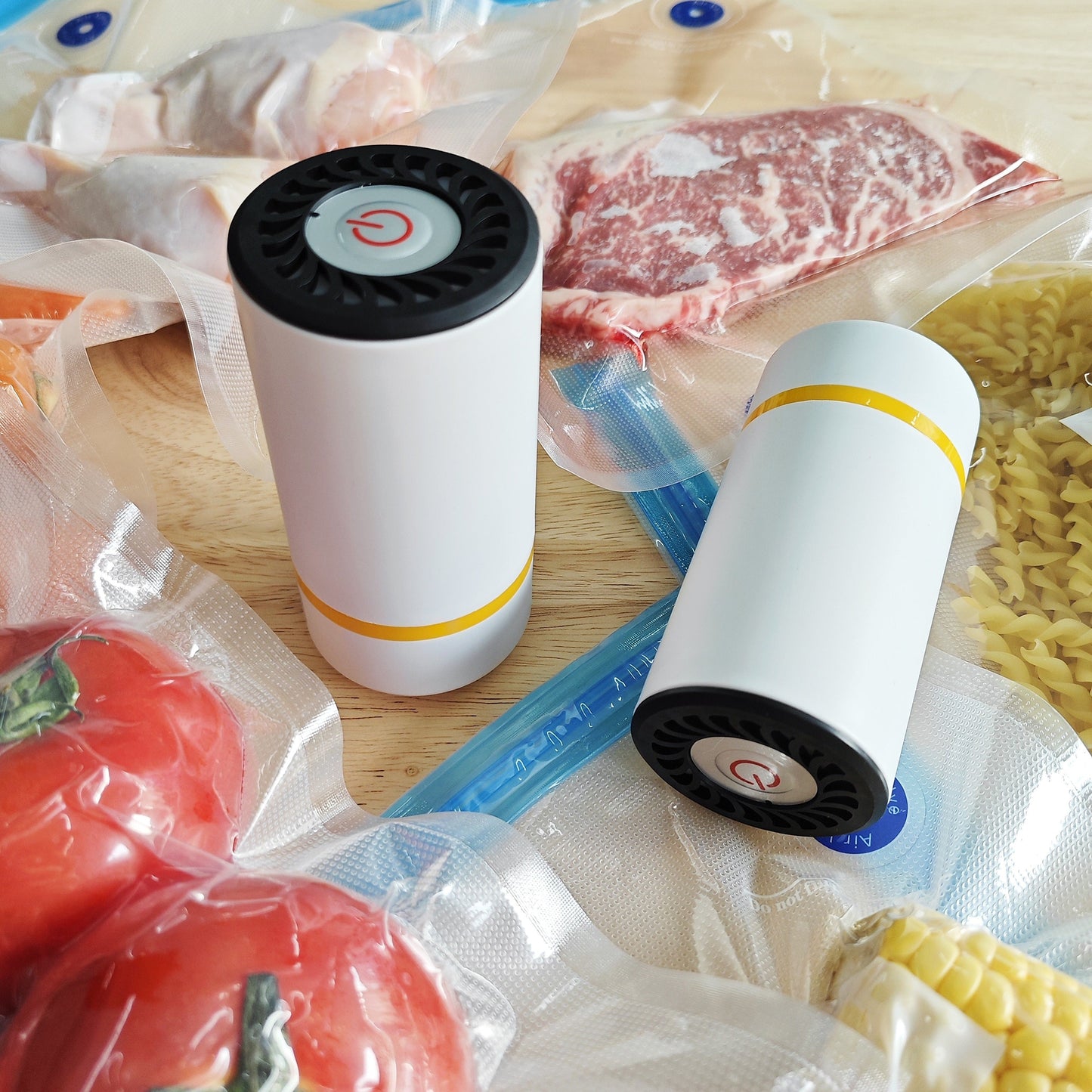 Get the Portable Vacuum Sealer Electric Pump with 5 Reusable Bags - Perfect for Food Storage, Meal Prep, and Sous Vide. This compact machine helps you save food and money. Fits pre-cut seal bags with its universal design. Bags and sealer sold separately.