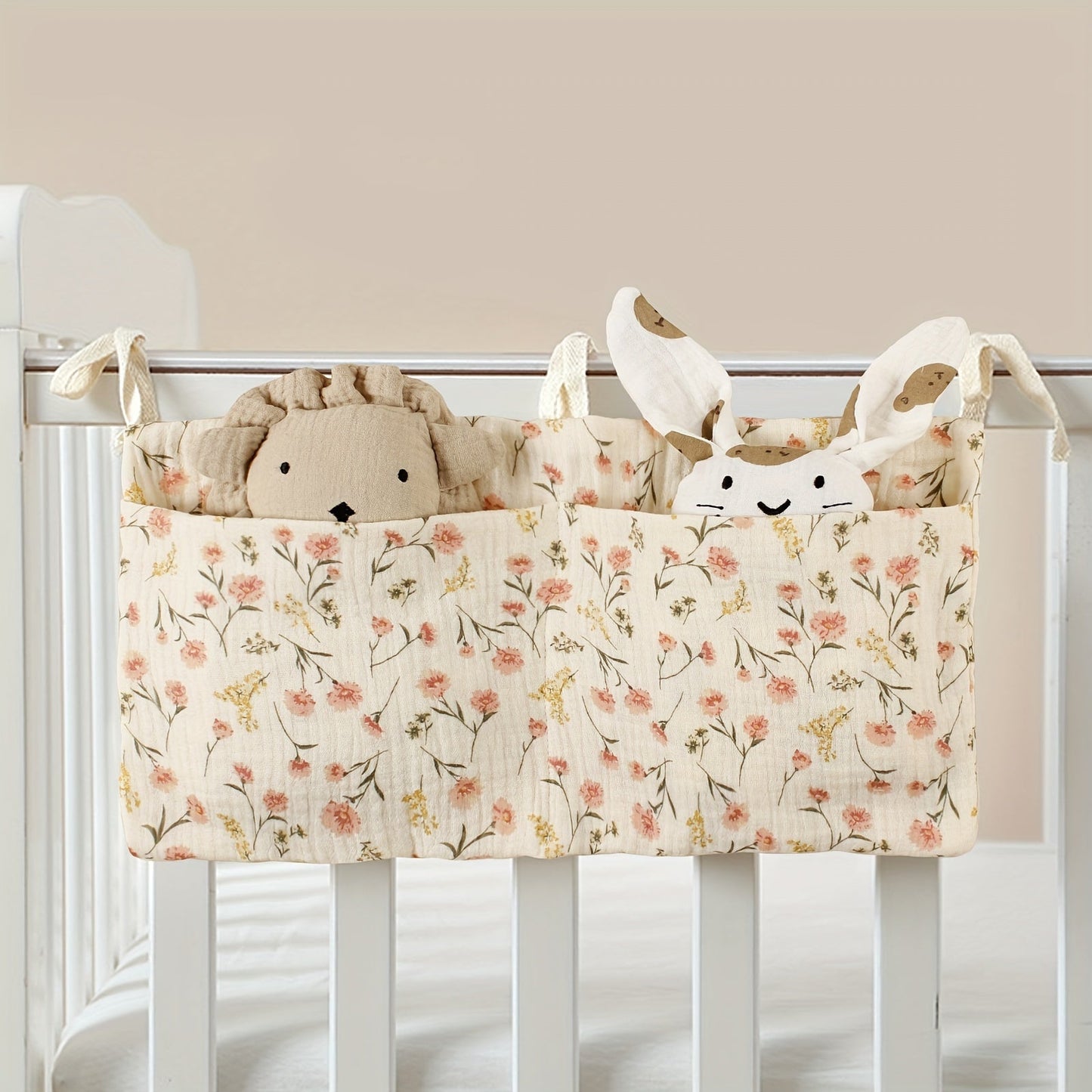 Bag with double cotton pockets hanging, designed for storing diapers on strollers.