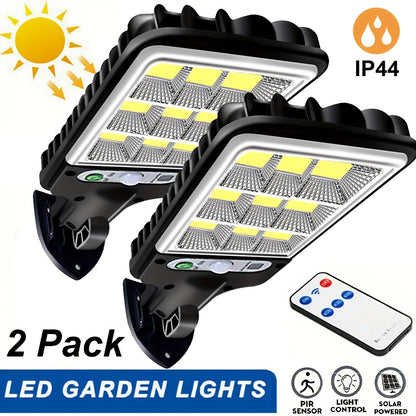 Solar motion sensor lights pack with controller for security lighting in garden or yard.