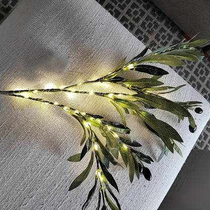 Olive Branch LED Lamp with Fairy Lights and artificial greenery tree. Ideal for various occasions. Mixed color, battery-operated with button control. Modern and festive accent.