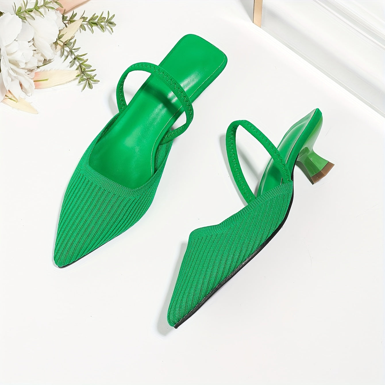 Solid color knit mules for women with flared heel and slingback style, featuring a trendy point toe design for comfort.