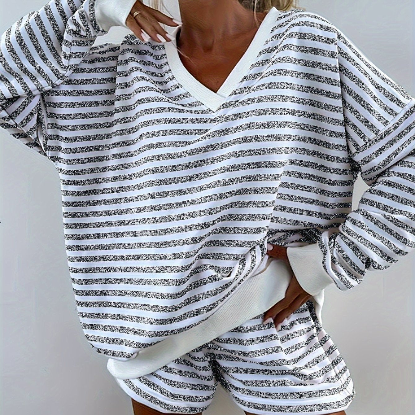 Striped lounge set for women, loose fit with long sleeve top and shorts, perfect for comfy fall wear.