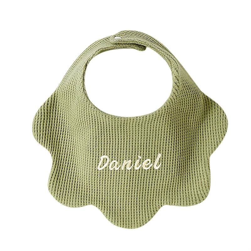 Customize your baby's style with our Personalized Drool Bibs. These bibs feature custom embroidery, an adjustable snap closure, and soft absorbent knit fabric. They make the perfect gift for a baby shower or holiday. Suitable for babies aged 0-3 years