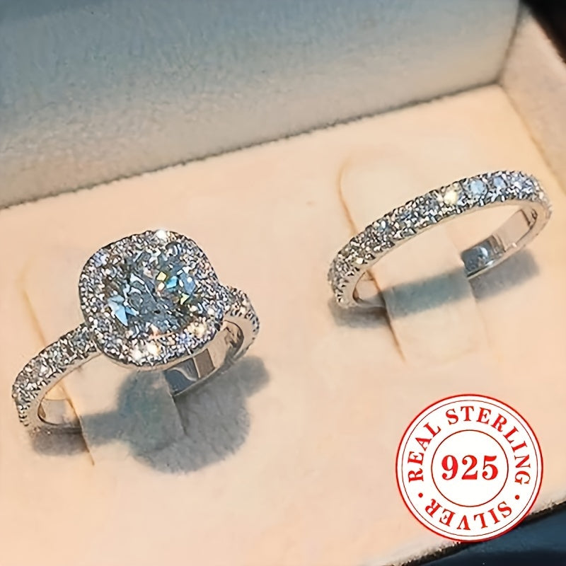 Celebrate your love with our Valentine's Day 2-Piece Engagement Ring Set for Women, crafted from 4.9g of 925 Sterling Silver. Featuring a classic 4-Prong Solitaire design with sparkling Cubic Zirconia stones, this elegant set is perfect for weddings