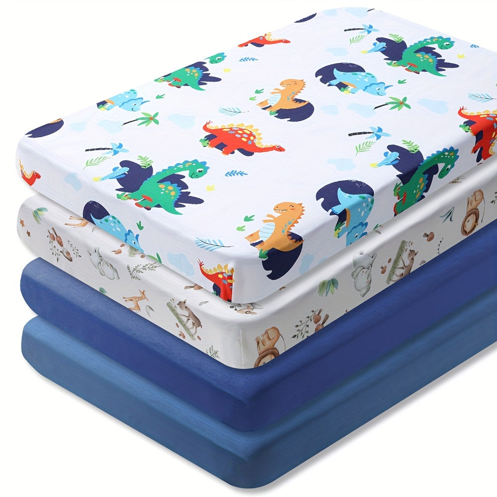 Soft & breathable fitted sheet set with solid colors and lion/dinosaur designs, perfect for home decor.