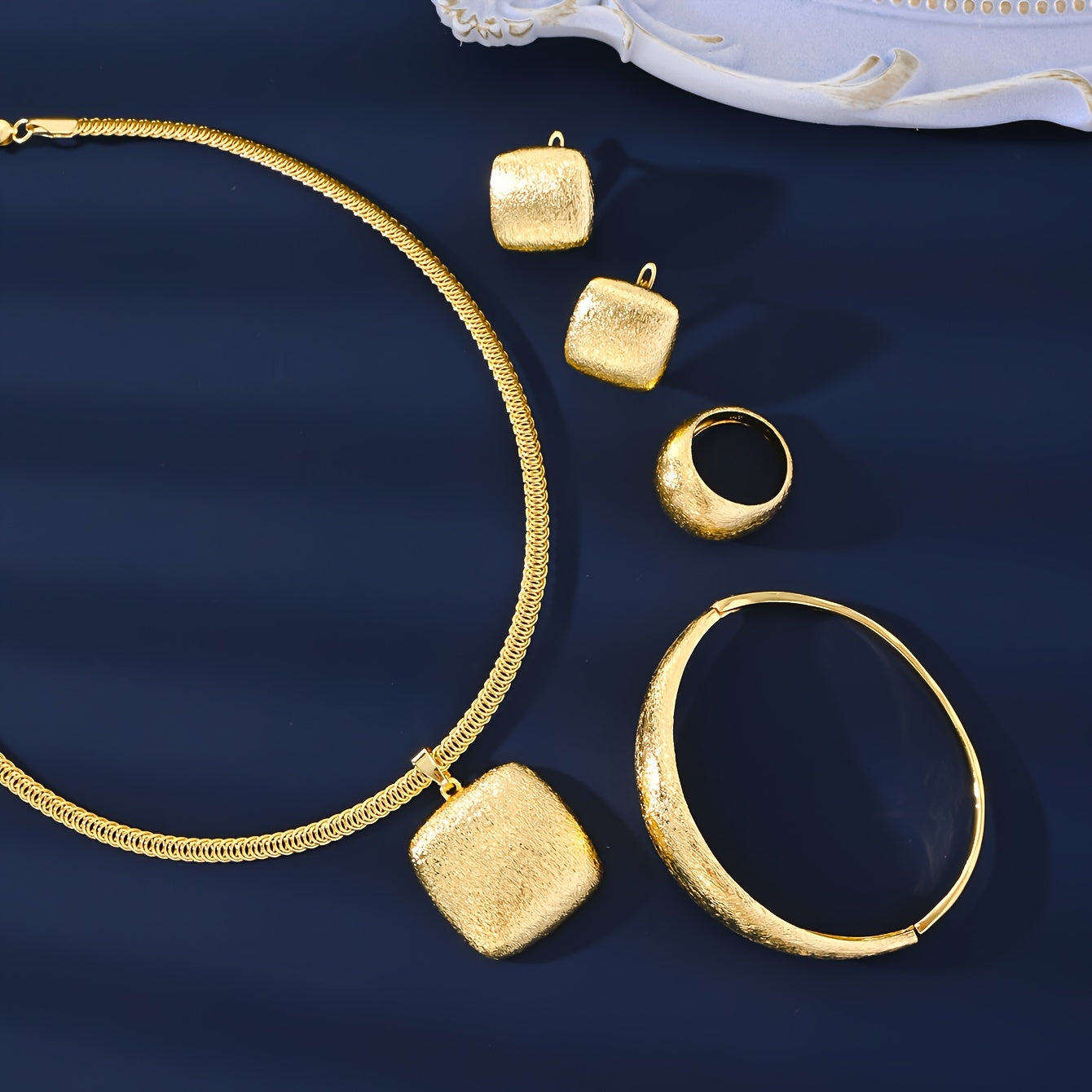 Vintage Style Jewelry Set with 4 Pieces - Necklace, Bracelet, Ring, Earrings. Made of 18K Gold Plated Copper. Perfect for Women, Suitable for Both Daily Wear and Special Occasions.