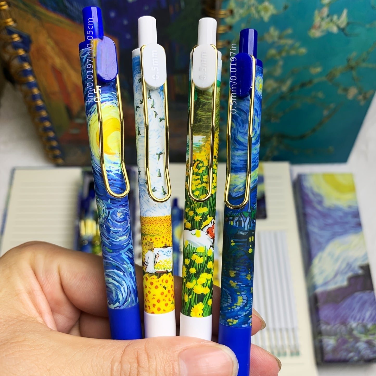 4pcs Set of Van Gogh Starry Night Pens with retractable 0.5mm fine tip, high quality and smooth writing. Ideal for diaries and school supplies.