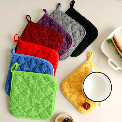 Kitchen set including 3 pieces of anti-scald towel cloth, insulation pads, microwave gloves, and pot mat. Made of silvery coated fabric in plain color.