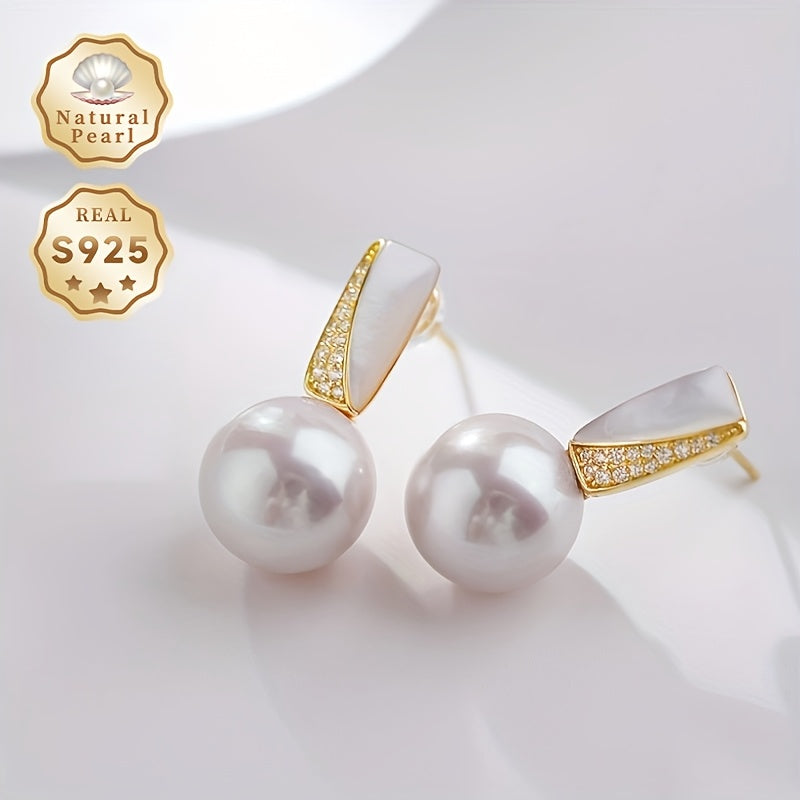 Surprise someone special with this must-have gift box containing a pair of fashionable dangling earrings for women. Made with S925 silver and featuring lustrous 11-12mm round natural freshwater pearls, each pair is unique as the natural pearls come in