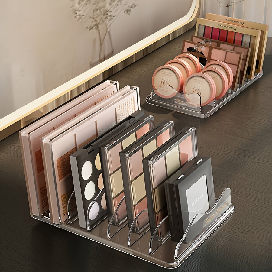 Plastic makeup palette organizer with wave divider, countertop storage rack for cosmetics. Compact and lightweight, under 68.58 cm tall. Stores multiple makeup palettes.