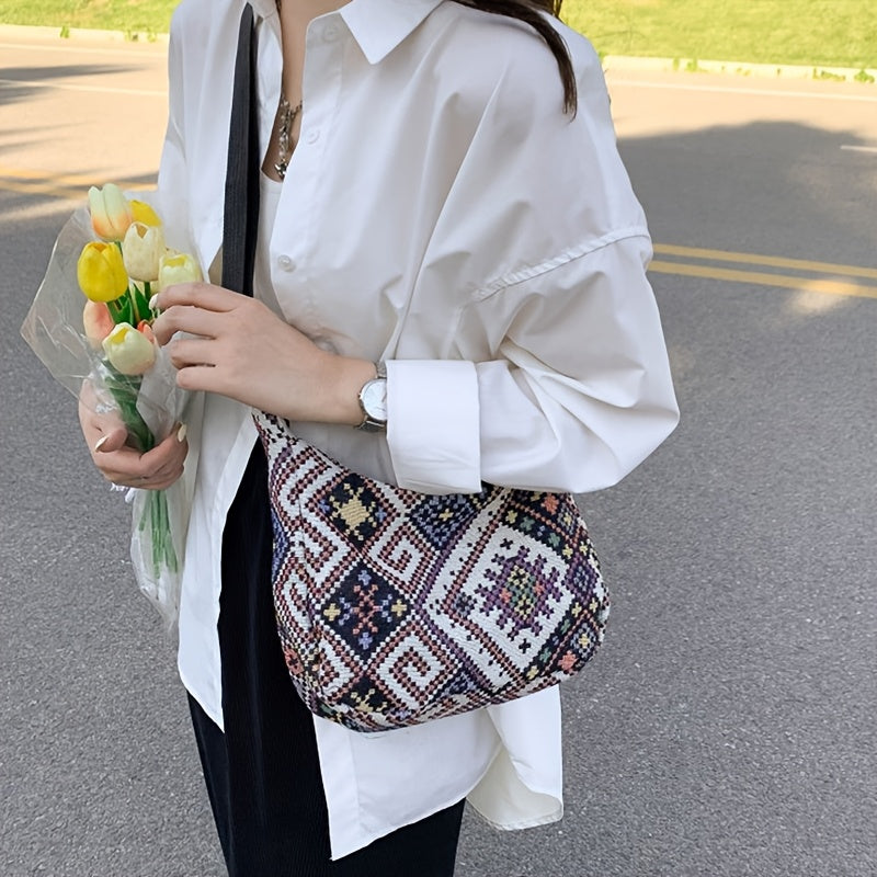 Single shoulder tote bag from the new spring and summer collection, perfect for daily use. Features stylish and versatile design with random zip direction and pattern printing.