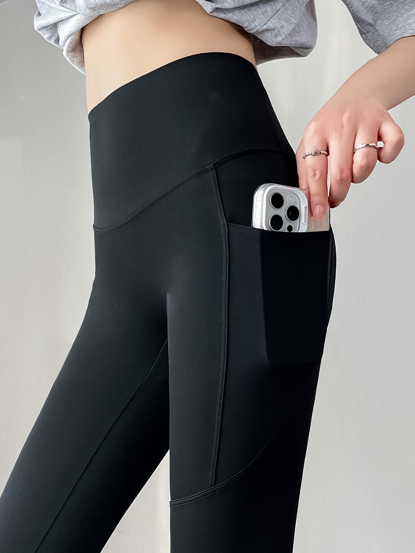 Shark Pants for Women: High-waisted leggings with tummy control, butt lifting effect, pockets, and mesh splicing. Perfect for cycling and sports.