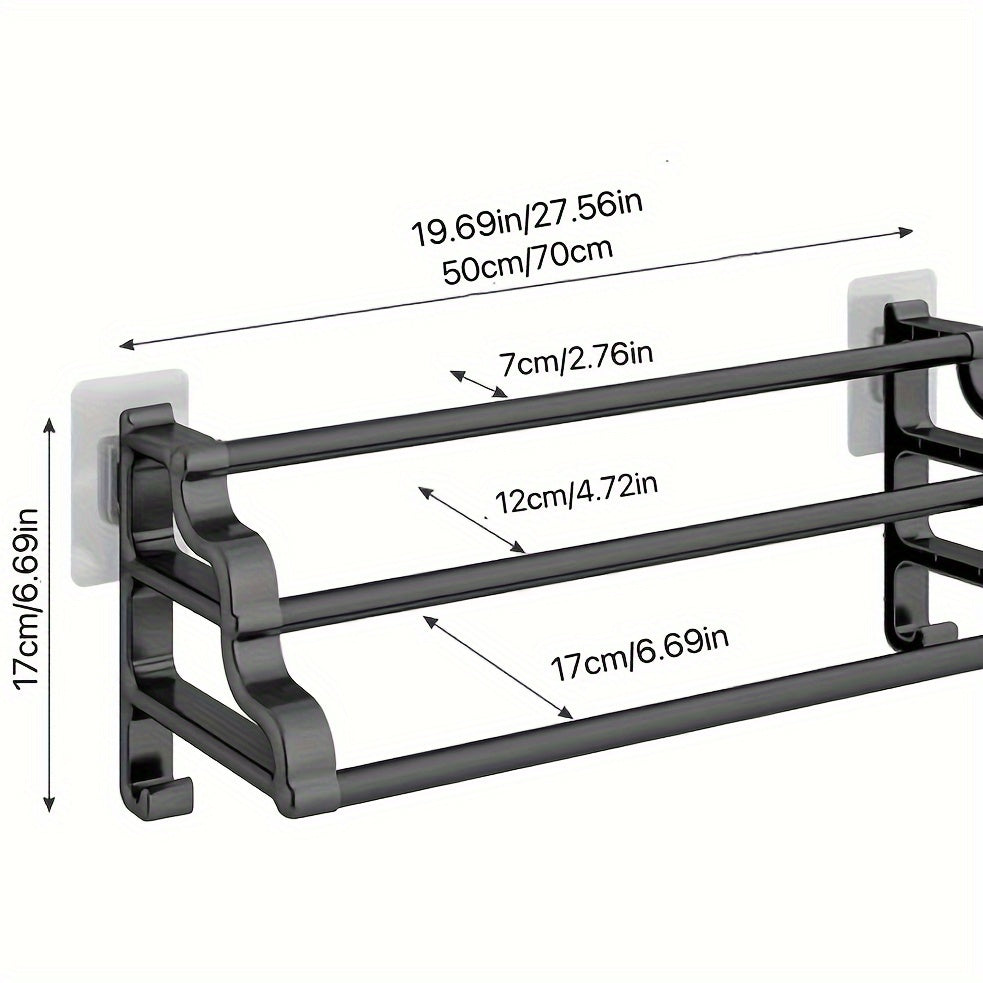 Durable triple bar towel rack with wall mount for organized bathroom storage.