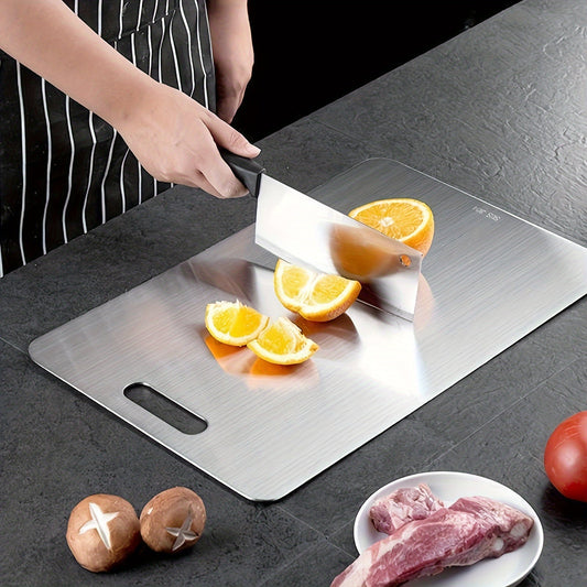 Upgrade your kitchen with our Titanium Cutting Board - A Durable and Hygienic Kitchen Essential. Made from 100% Pure Japanese Double-Sided Medical Grade Titanium for unparalleled durability. This Silver cutting mat is perfect for all your culinary needs