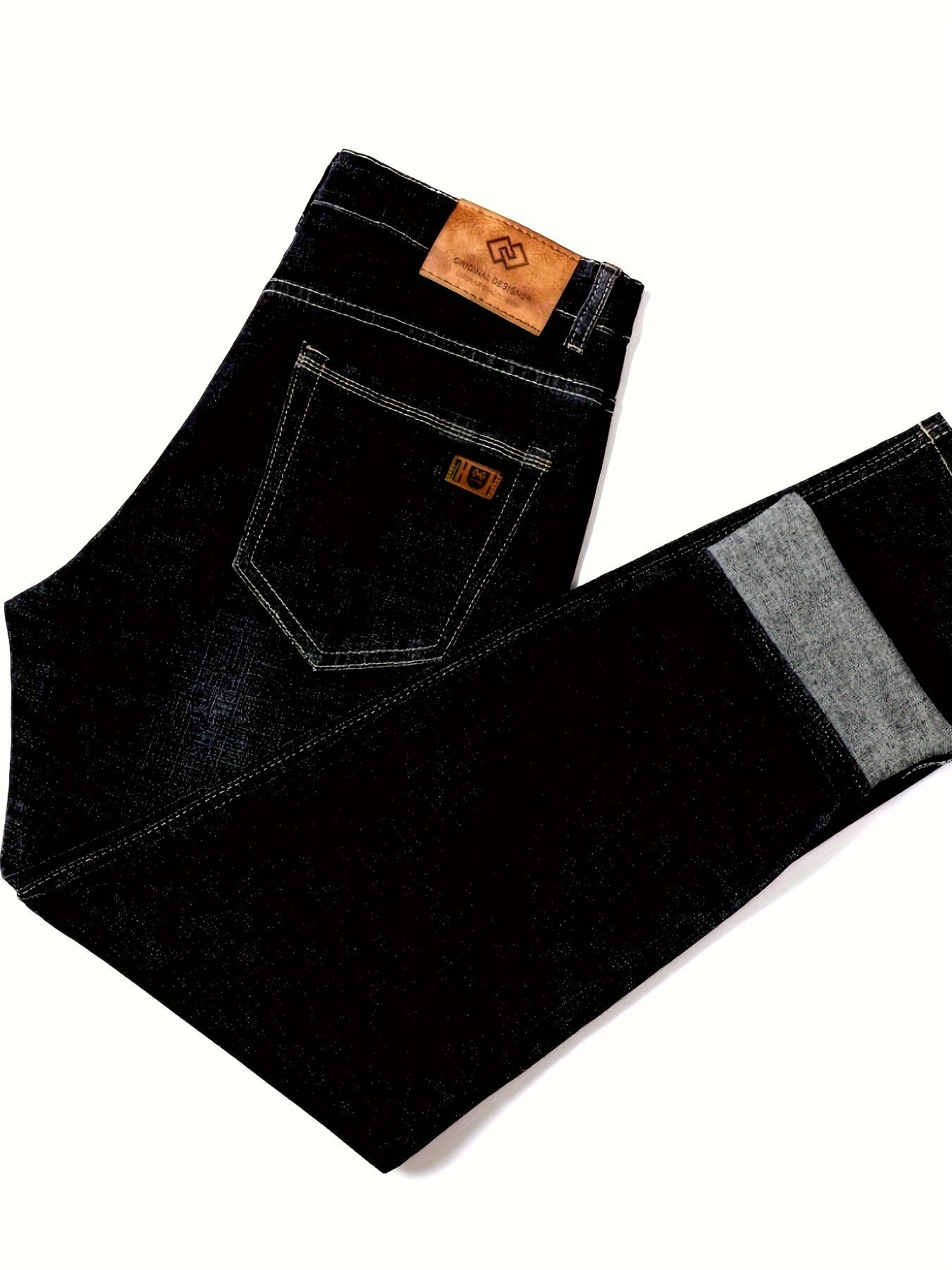 Men's solid denim trousers with pockets, casual cotton blend jeans for outdoor activities.