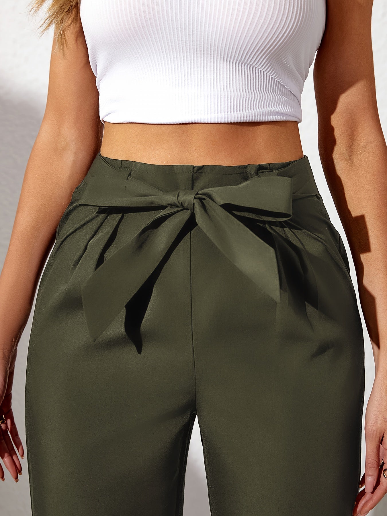 Solid straight leg pants with elastic drawstring waist and elegant bow detail. Perfect for spring and summer in plus size.