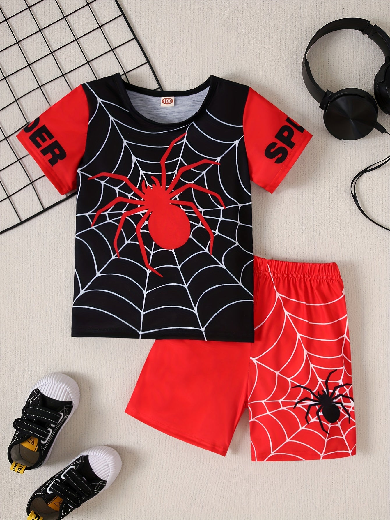 Boys 2-piece casual outfit set with spider web print tee and shorts for summer wear.