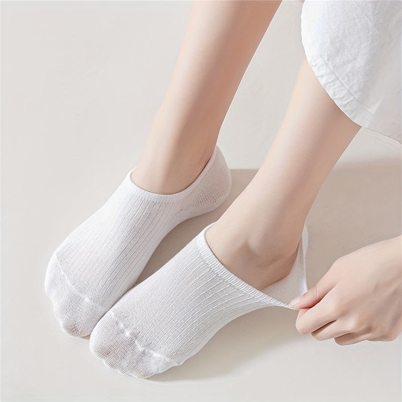 30 pairs of women's breathable no-show socks made of a polyester and spandex blend with moisture-wicking properties. These socks are black, white, and grey striped, with anti-odor