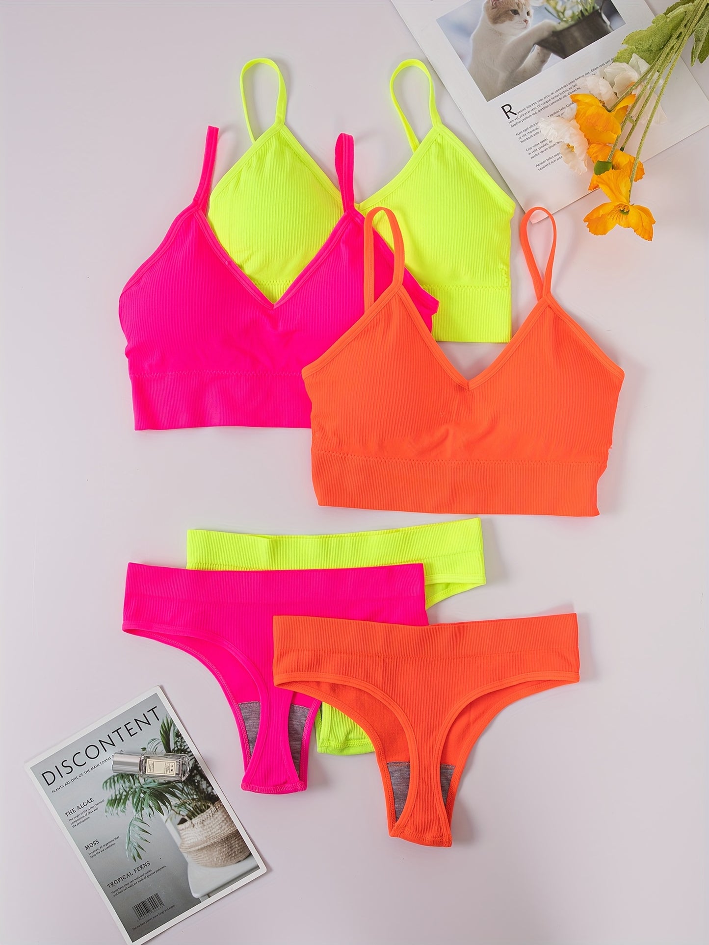 3-piece ribbed lingerie set includes bra, panties, and tank bra with elastic panties.