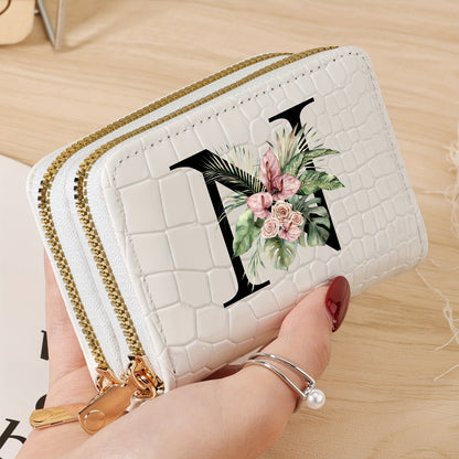 Women's credit card wallet with elegant floral letter print in black & white. Features large capacity, dual zipper, crocodile texture PU, lightweight design with nylon lining for everyday