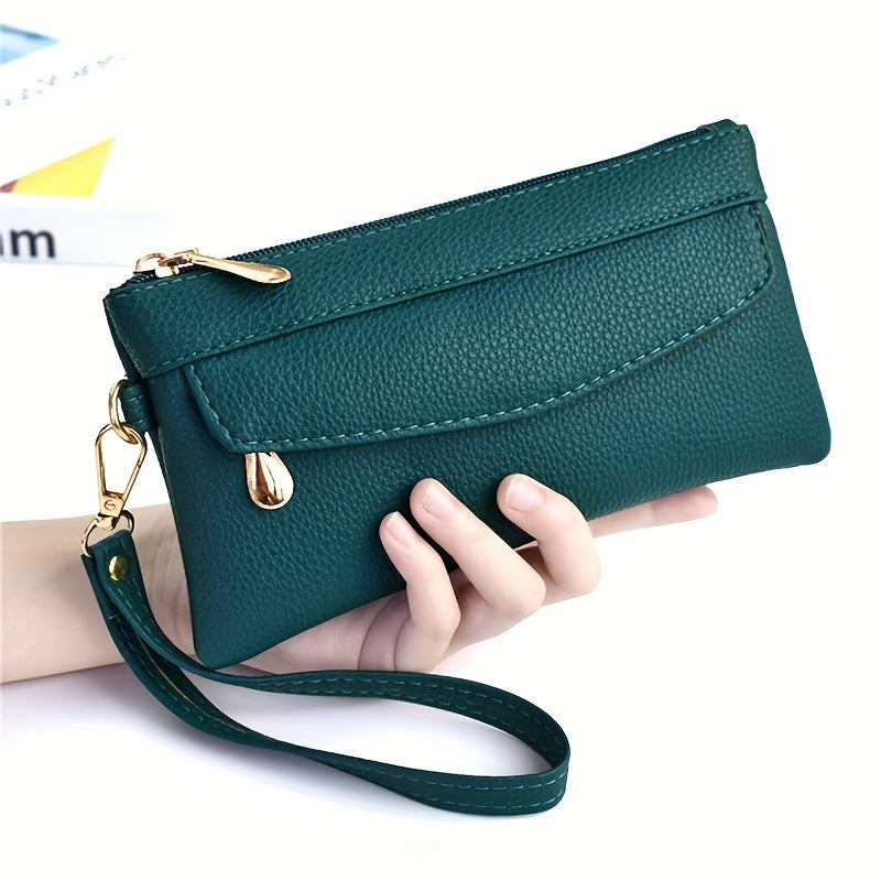 Chic black wristlet clutch with zipper, multi-compartments, golden hardware. Ideal for everyday use.